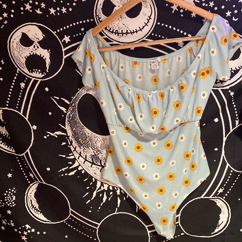 XL light blue body suit with flowers on it